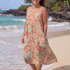 Floral beach midi dress in coral and green, sleeveless with tiered skirt