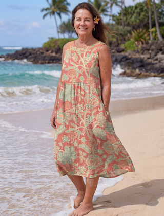Floral beach midi dress in coral and green, sleeveless with tiered skirt