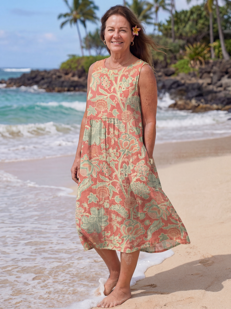 Floral beach midi dress in coral and green, sleeveless with tiered skirt