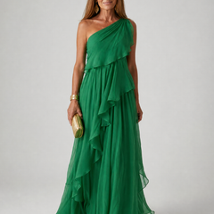 Green one-shoulder maxi dress with layered ruffles and flowing chiffon skirt