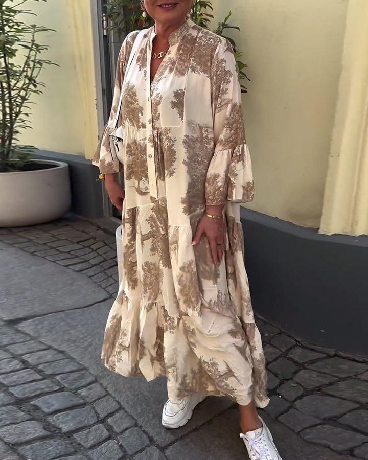 Flowing long beige-and-brown printed dress with V-neck, button front, tiered skirt