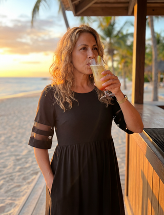 Black midi dress with short sleeves and ruched empire waist, sheer stripe details