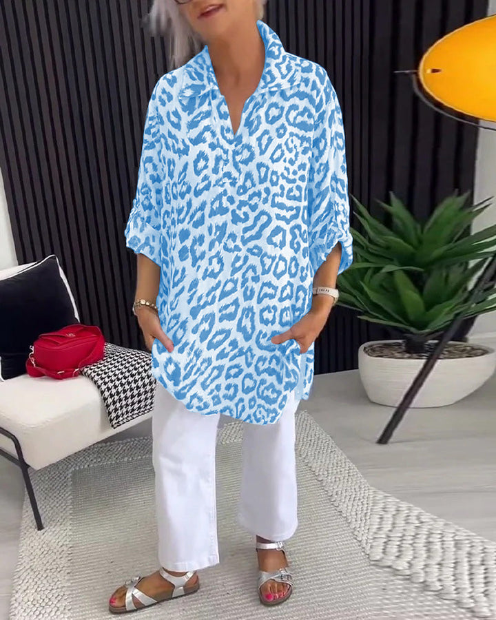 Blue leopard print collar blouse with half sleeves and relaxed tunic hem