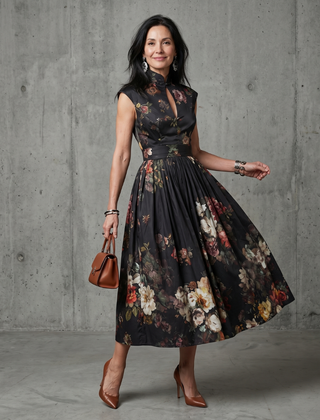 Black floral pleated midi dress with high-neck keyhole and sleeveless bodice
