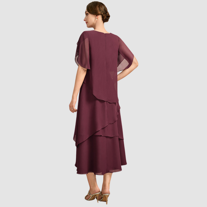 Burgundy chiffon midi dress, back view, layered ruffle hem and short draped sleeves