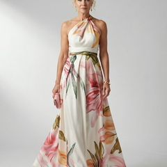 Light floral maxi dress with halter neck, pink and green flowers on a cream base