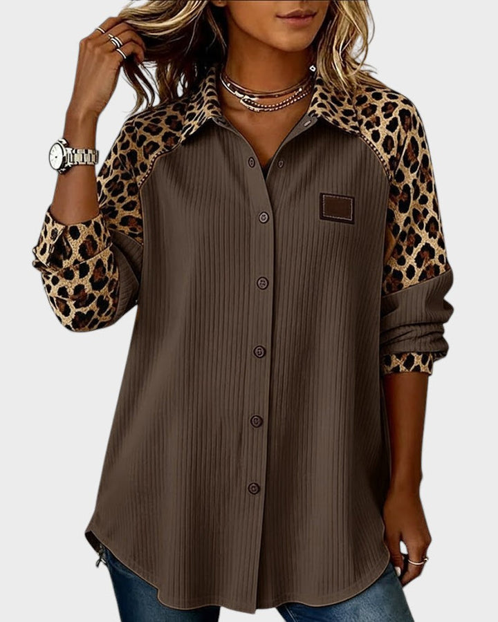 Leopard-print yoke button-down shirt with brown striped body and square chest patch