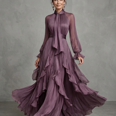 Purple tie-neck tiered maxi dress with long sheer sleeves and ruffle layers