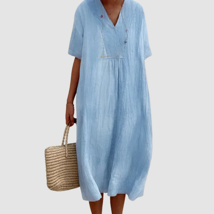 Blue bohemian dress with V-neck, short sleeves, gathered waist, loose midi fit