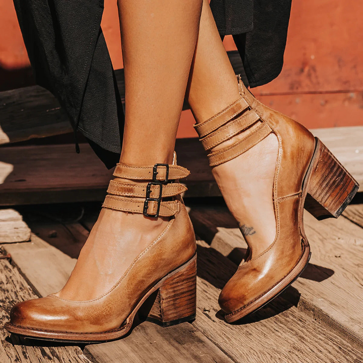 Tan ankle strap sandals with stacked block heel and buckle closure