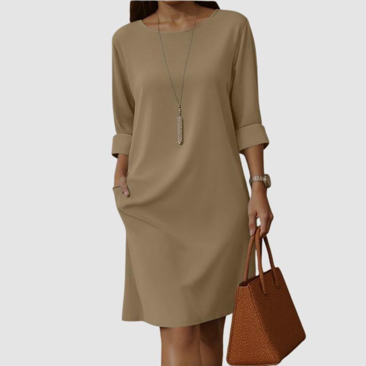 Beige crew-neck midi dress with 3/4 sleeves and side slit, relaxed drape.