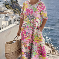 Pink floral midi dress with short sleeves and round neckline, loose gathered skirt