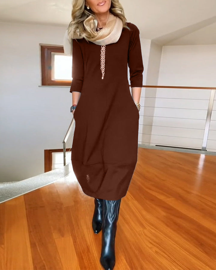 Nia casual elegance dress, brown color, three-quarter sleeves, midi length, round neckline