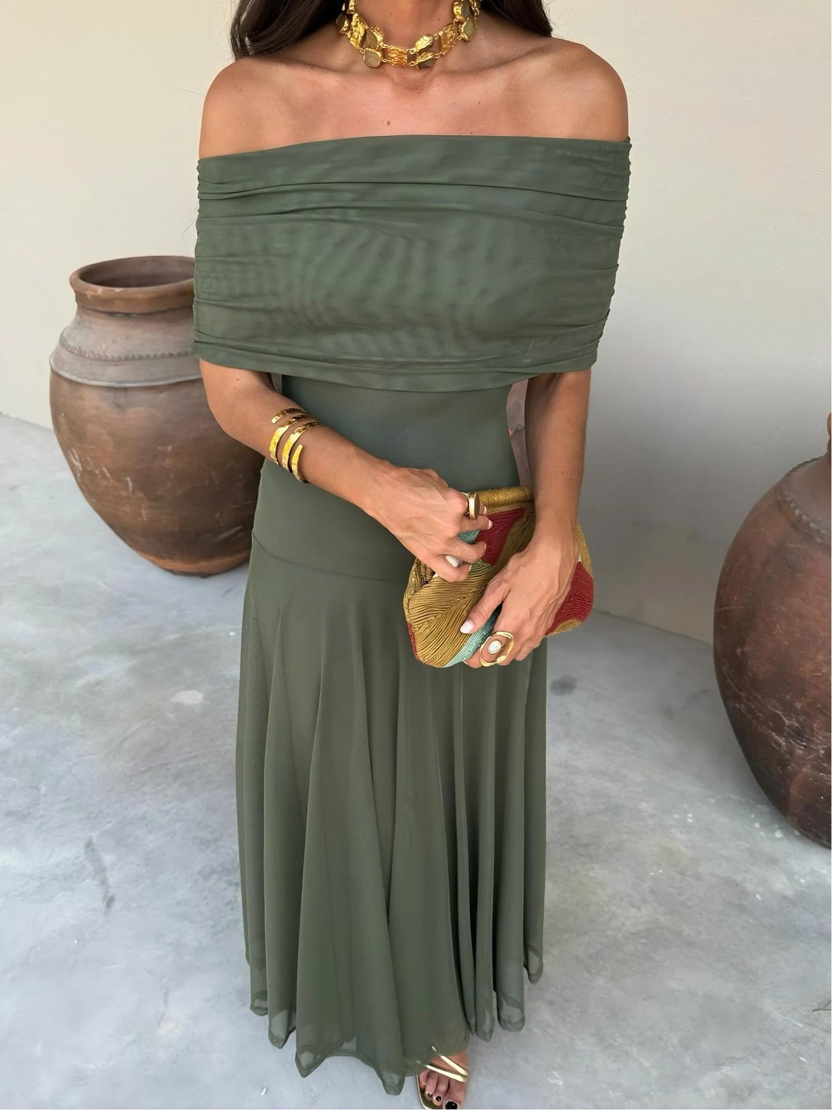 Toledo maxi dress in deep green, off-shoulder neckline with gathered waist and flowing skirt