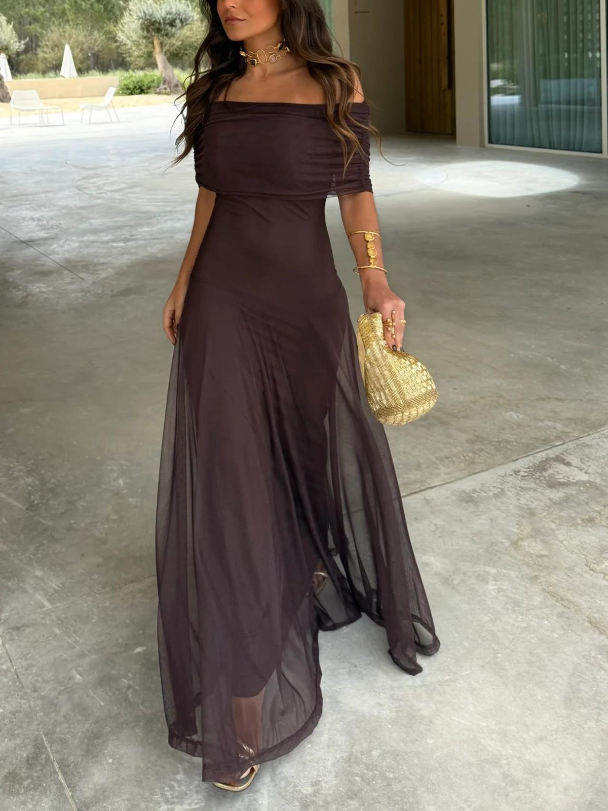 Off-shoulder ruched maxi dress in dark plum with flowing sheer skirt