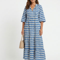 Sky blue tiered midi dress with diamond print, V-neck and half sleeves