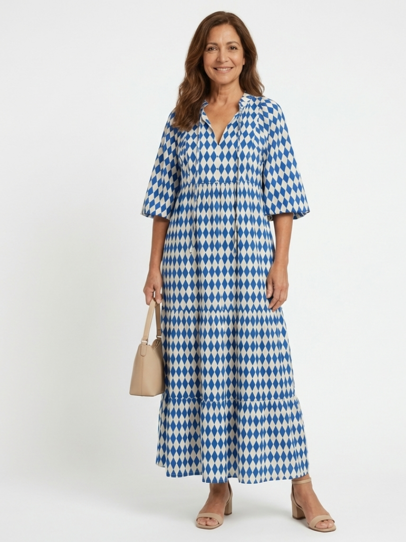 Sky blue tiered midi dress with diamond print, V-neck and half sleeves