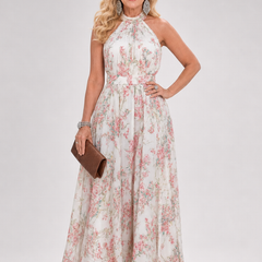Floral halter midi dress with sleeveless bodice and flowing gathered skirt in light tones