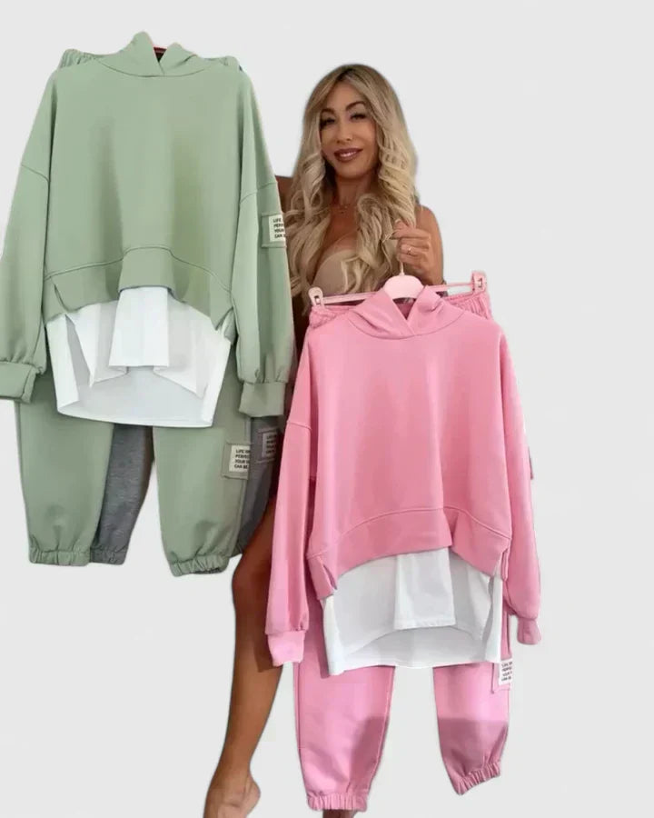 Pink hooded sweatshirt and jogger set with white layered underpiece