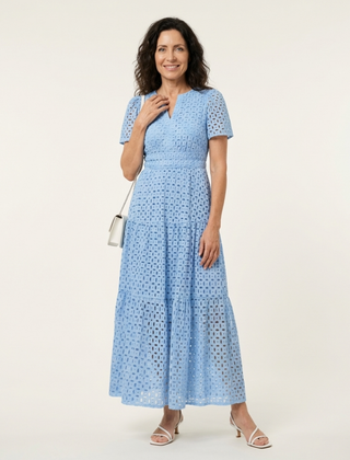 Sky blue V-neck tiered midi dress with short sleeves and textured eyelet dot pattern