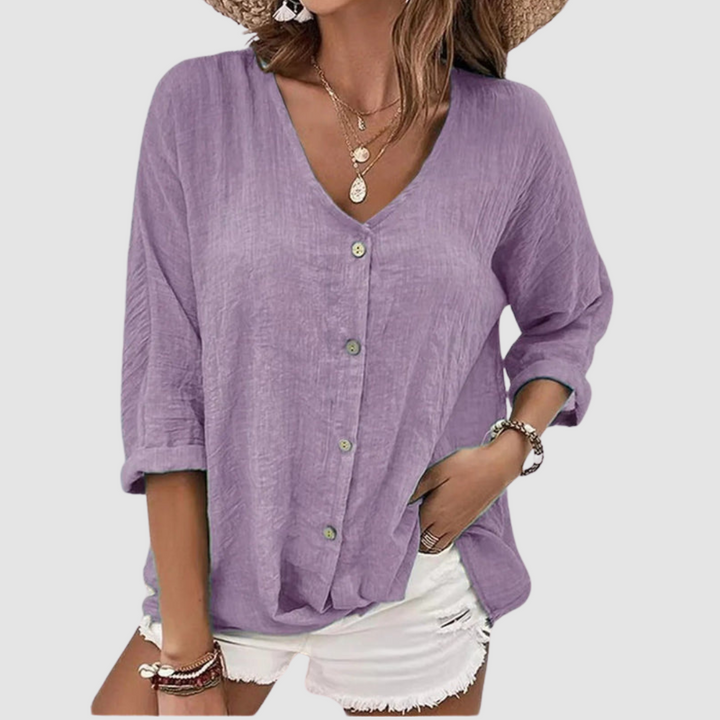 Purple V-neck button-front breathable blouse with 3/4 sleeves and relaxed fit