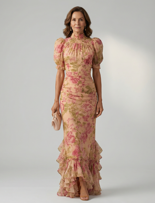 Floral pink high-neck maxi dress with puff sleeves and tiered ruffle hem.