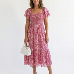 Pink floral off-shoulder smocked midi dress with short puff sleeves, tiered skirt