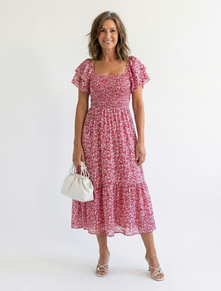 Pink floral off-shoulder smocked midi dress with short puff sleeves, tiered skirt