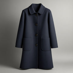 Elio wool coat in navy blue with notched collar, button front, and two patch pockets.