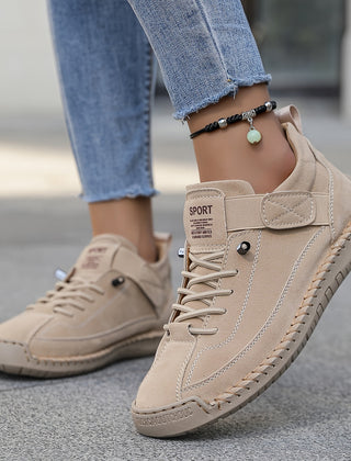 Orthopedic comfort sneaker in beige with hook-and-loop strap and lace-up.