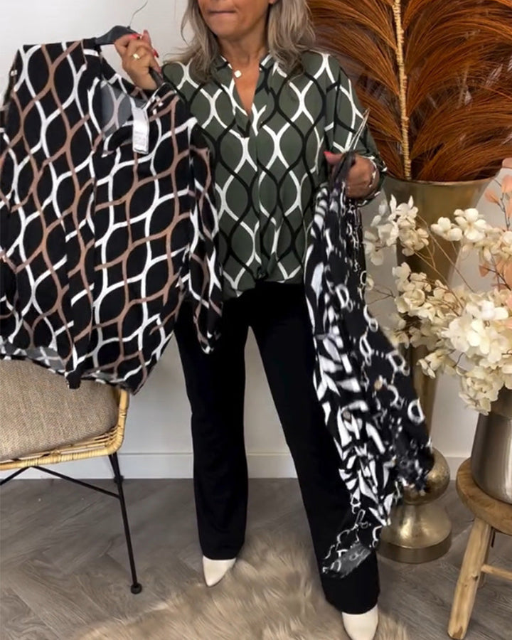 Graphic print blouse, black with white arch pattern, V-neck with button placket