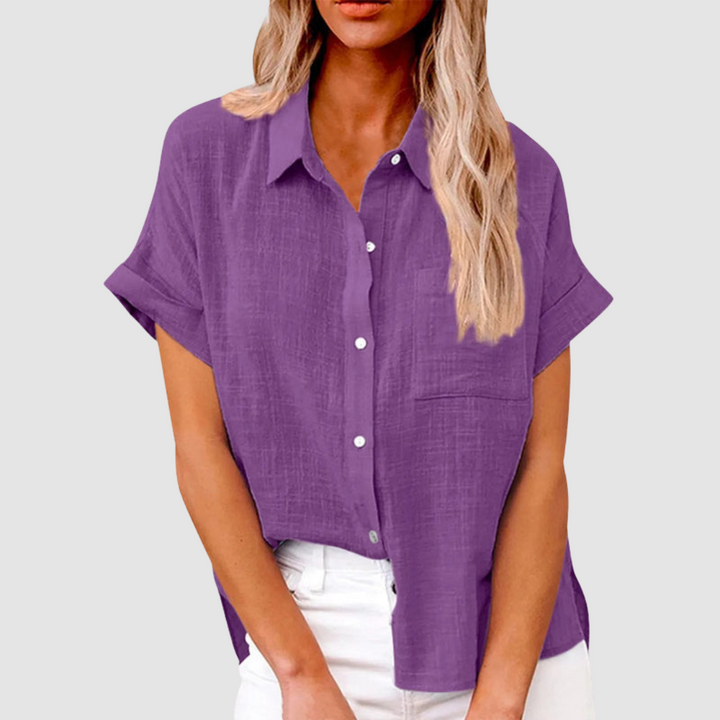 Short-sleeve button-up blouse in purple with collar and chest pocket.