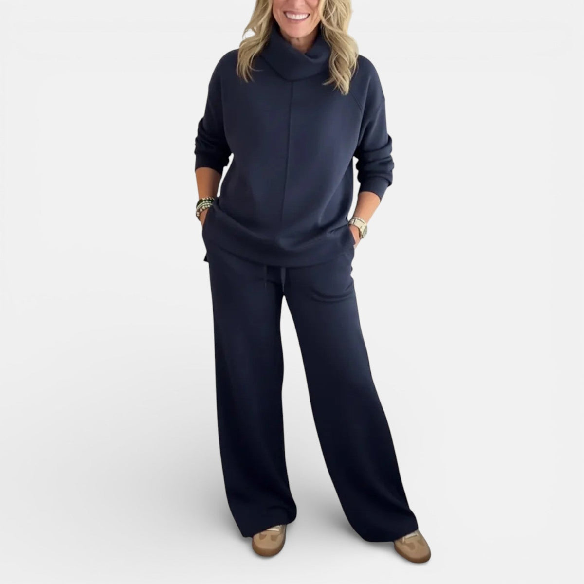 Dark navy two-piece lounge set with hooded pullover and wide-leg pants