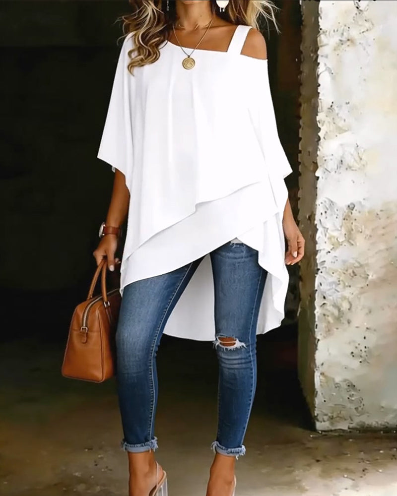 White asymmetric cold-shoulder blouse with draped layered hem and short sleeves