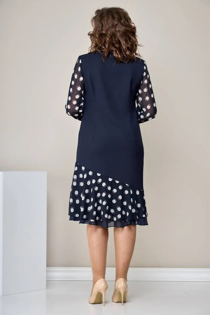 Navy chiffon dress, back view, polka-dot sleeves and flared ruffle hem