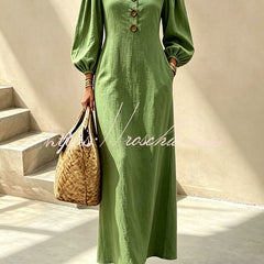 Green v-neck maxi dress with button front and lantern sleeves