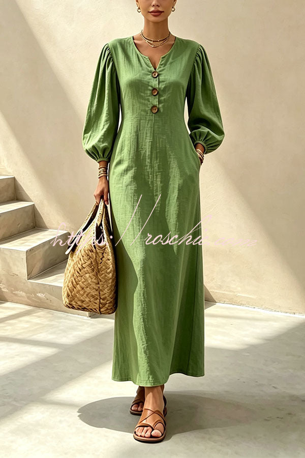 Green v-neck maxi dress with button front and lantern sleeves
