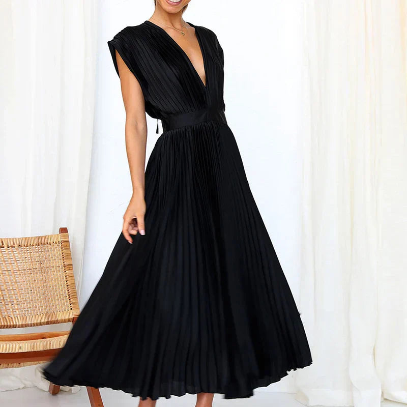 Black pleated V-neck maxi dress with cap sleeves and elastic waist