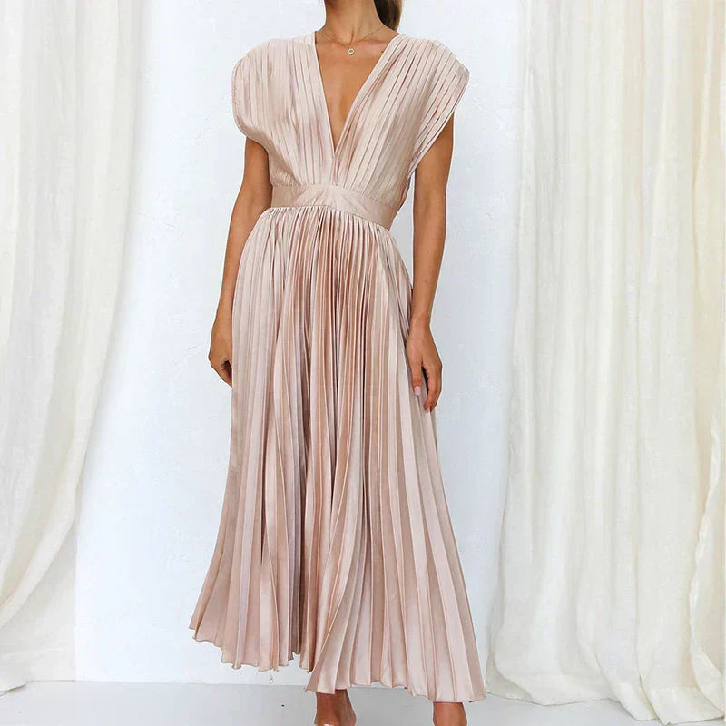 Light blush pleated V-neck maxi dress with cap sleeves and gathered waist