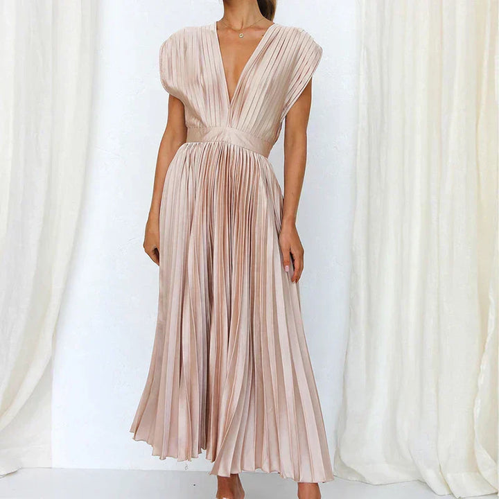 Light blush pleated V-neck maxi dress with cap sleeves and gathered waist
