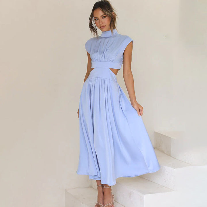 Light blue sleeveless maxi dress with high neck and gathered waist pleated skirt