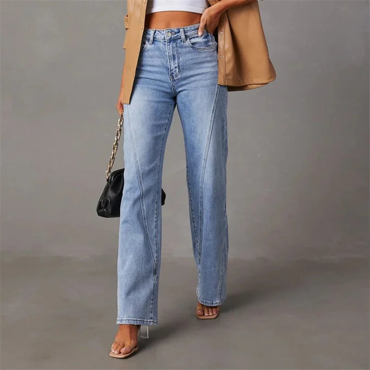 Light blue flared jeans with front creases, belt loops, and straight-to-flare silhouette