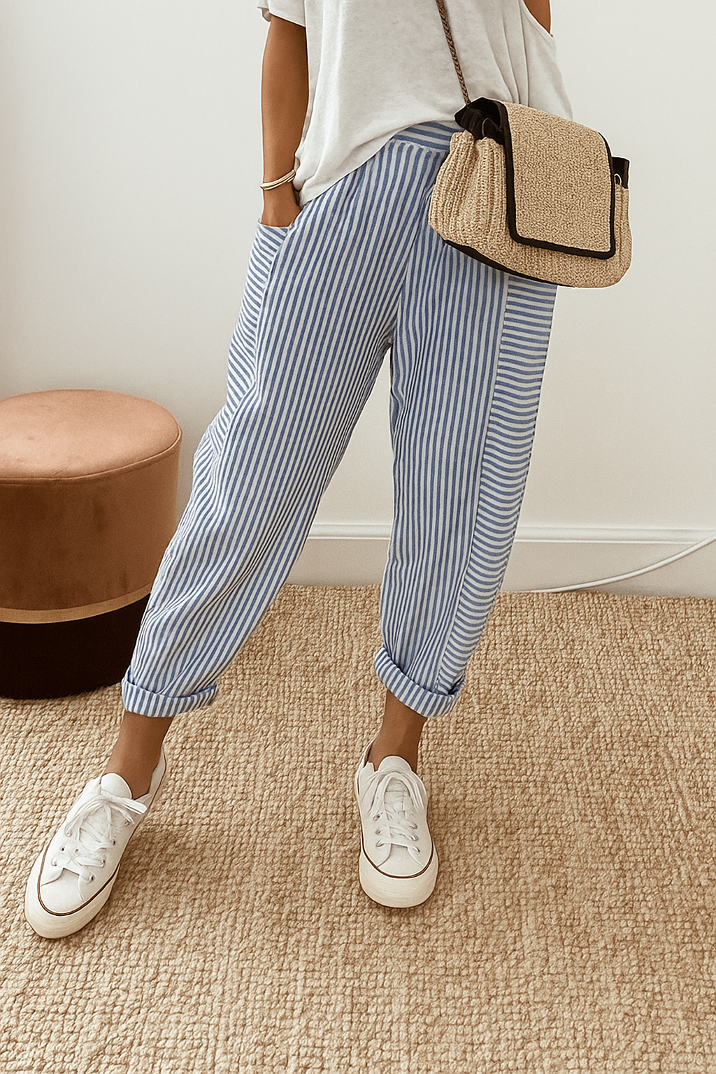 Blue-and-white striped jogger pants with cuffed ankle and drawstring waist