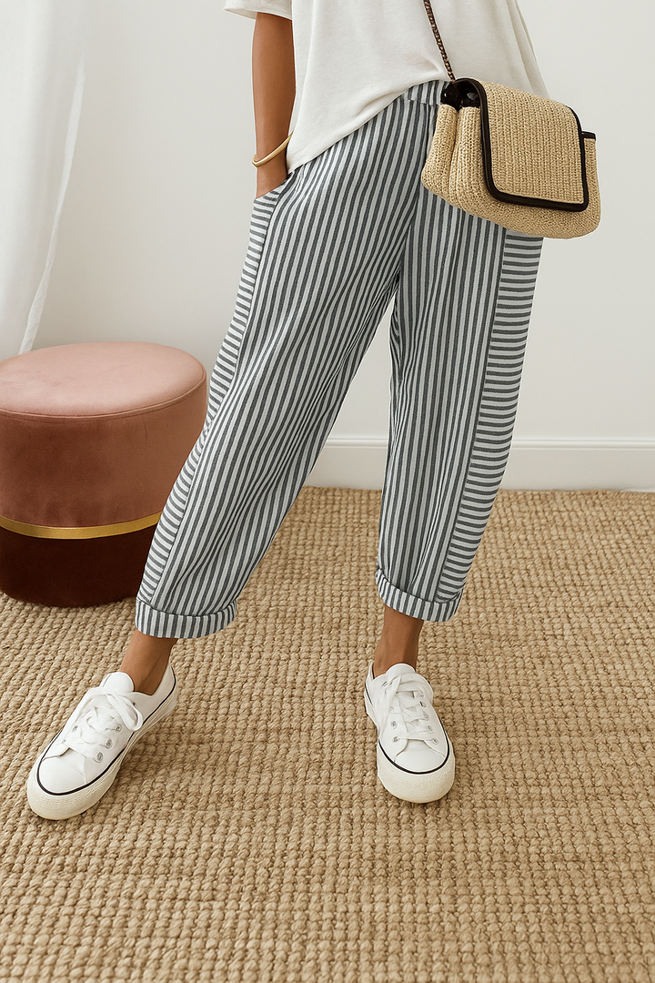 Gray-and-white striped jogger pants with cuffed ankle and relaxed straight legs