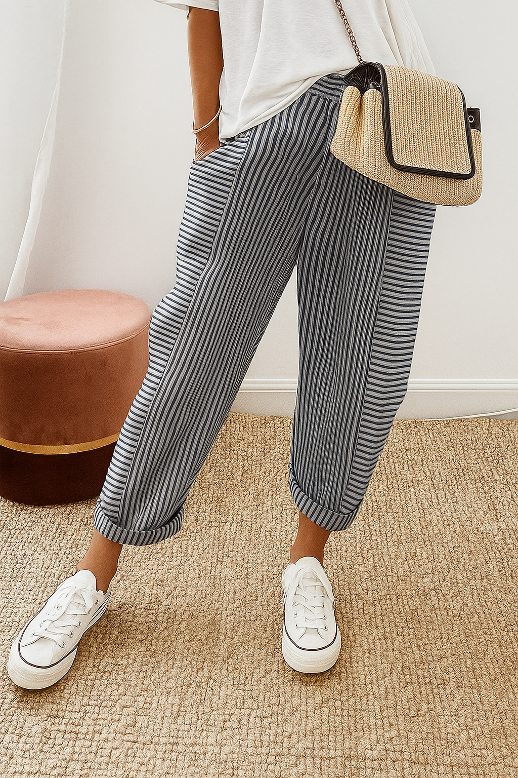 Dark-and-white striped jogger pants with cuffed ankle and relaxed fit