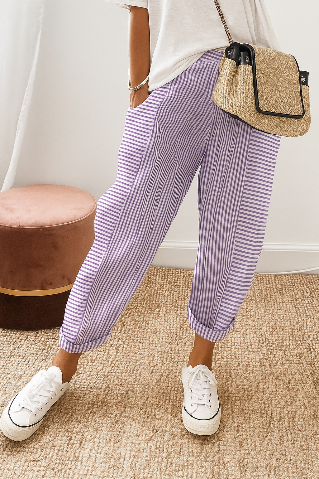 Purple-and-white striped jogger pants with cuffed ankle and elastic drawstring