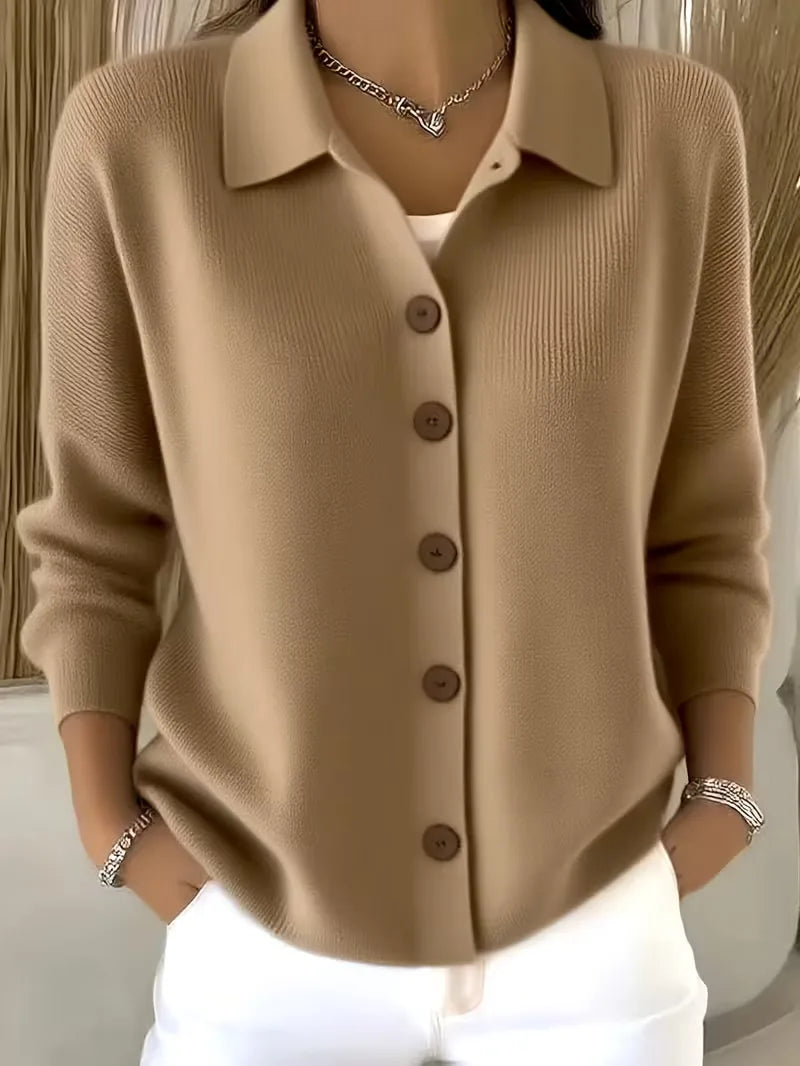 Beige button-front knit cardigan with point collar and dark buttons, long sleeves