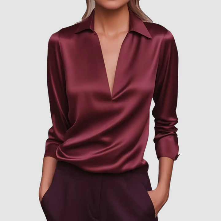 Burgundy satin blouse with collared deep V neckline and 3/4 roll-tab sleeves