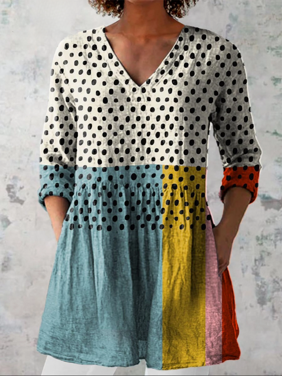 Long V-neck blouse with multicolor block panels and black polka-dot print