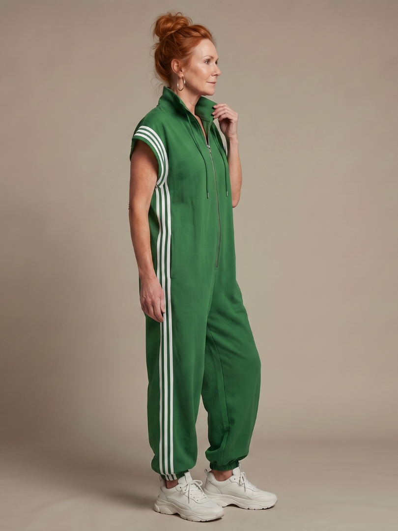 Green sleeveless zip-front jumpsuit with white vertical stripe trim
